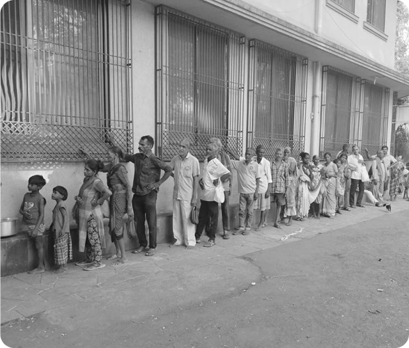Community members queuing for a meal drive